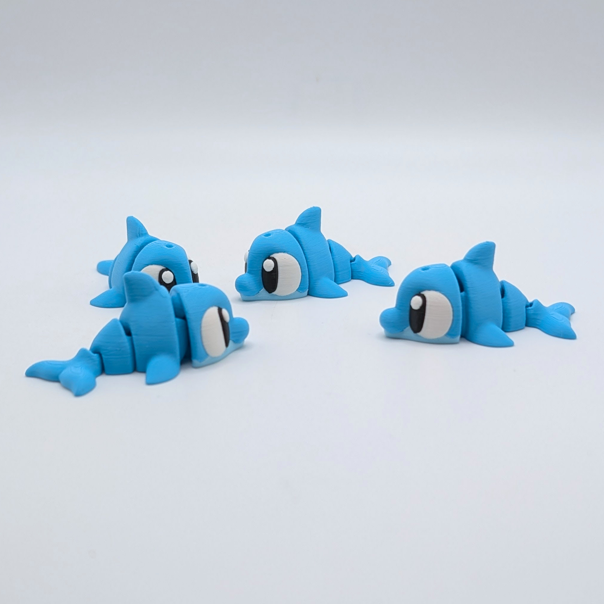 Articulated Flexi Dolphin Fidget Toy with Optional Tank