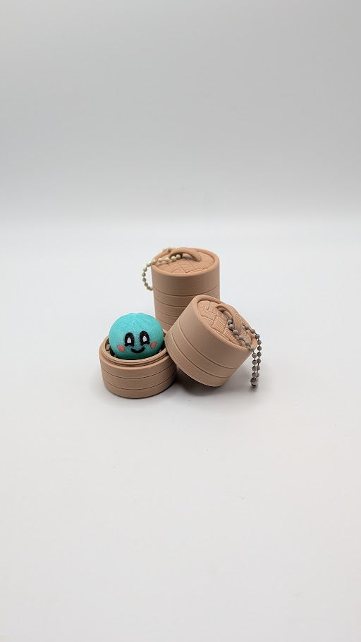 Dumpling Clicker Fidget Toy in Steamer Basket
