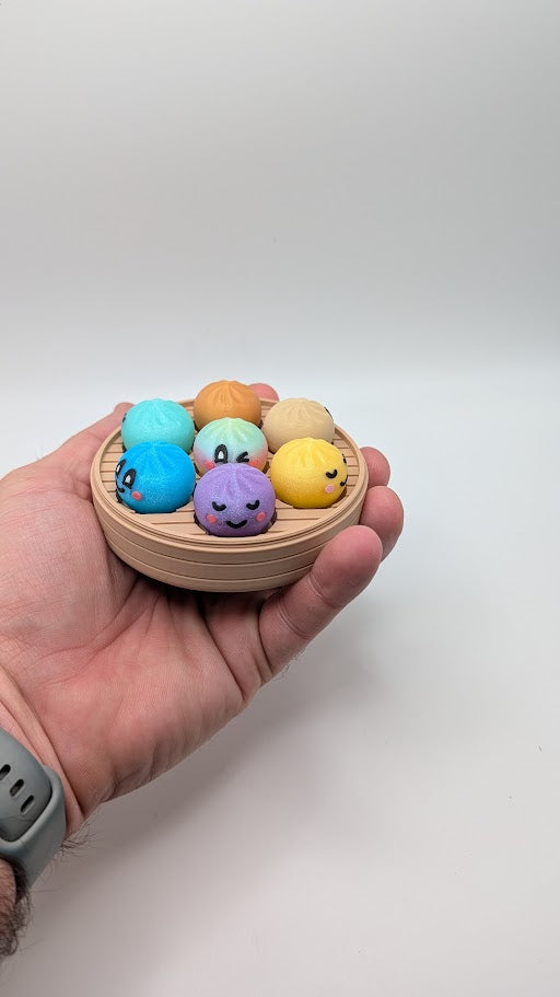 Dumpling Clicker Fidget Toy in Steamer Basket